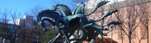 Sculpture of wild horses pulling in different directions