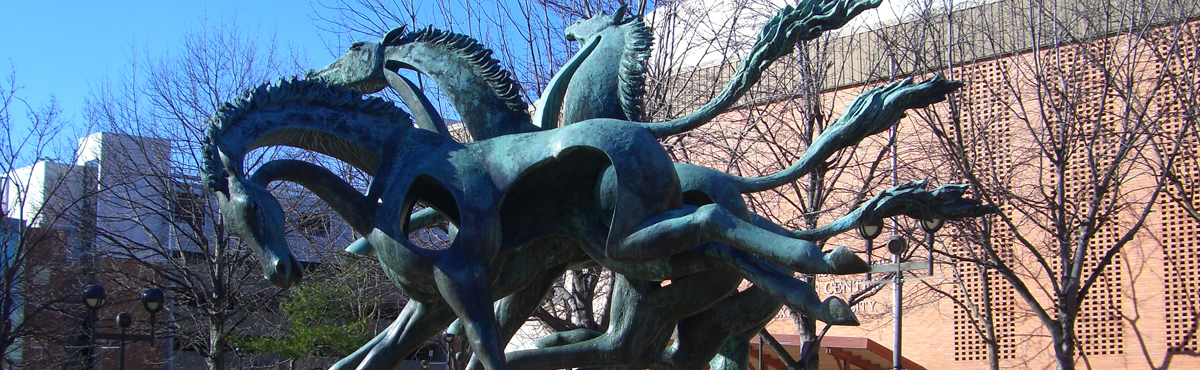Site banner image - statue of wild horses